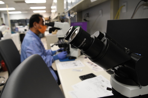 Lab services tools being used at a desk