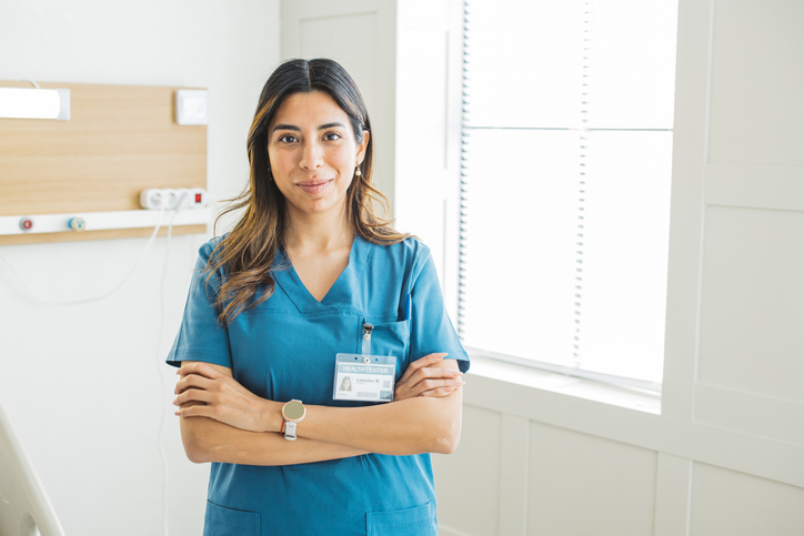 Certified nursing assistant standing confidently
